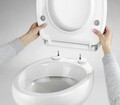 Capac de toaleta cu sistem automat de coborare Tavola, Wenko, 36.5x45 cm, termoplastic/inox, alb