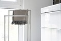 Suport pentru prosoape Ravina, Wenko, 48x20x80 cm, inox/sticla temperata, argintiu/negru