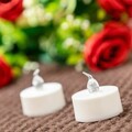 Set 12 lumanari LED tip pastile, Tealight Romandle, InnovaGoods, cu baterii, 70-75 h, Ø3.7 x 3.5 cm, alb