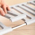 Suport extensibil pentru dulap / sub chiuveta Shibblek InnovaGoods, 37.5-66.5 x 38 x 28 cm, otel/ABS, gri
