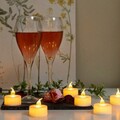 Set 12 lumanari LED tip pastile, Tealight Romandle, InnovaGoods, cu baterii, 70-75 h, Ø3.7 x 3.5 cm, alb